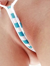 Blowing bubbles sounds like innocent fun in Japan until Elly steps out wearing a t-front bikini thong.