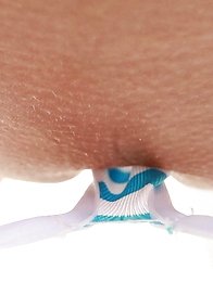 Blowing bubbles sounds like innocent fun in Japan until Elly steps out wearing a t-front bikini thong.