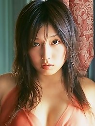 Sizzling hot asian beauty looks delicious in her red bikini