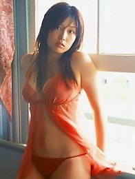 Sizzling hot asian beauty looks delicious in her red bikini