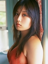 Sizzling hot asian beauty looks delicious in her red bikini