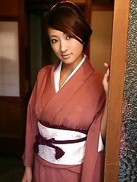 Sexy gravure idol beauty slowly takes off her pink kimono