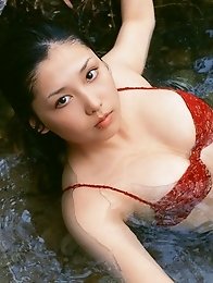 Plump asian beauty taking off her skimpy soft cream lingerie