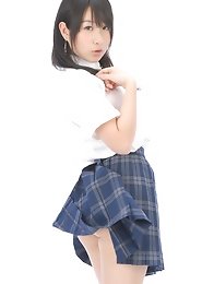 Adorable busty asian school girl lifts up her plaid skirt