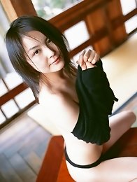 Captivating gravure idol chick enchants in her black lingerie