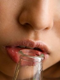 Sexy and horny Japanese av idol Yui Aoyama shows her licking skills with a bottle