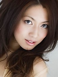 Japan girl Hikaru Takizawa undresses to show her sexy body and hairy pussy