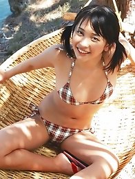Mami Yamasaki babe in pigtails poses in her swimsuit