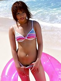 Horny and sexy Japanese av idol Miyu Sugiura goes to beach to strip naked