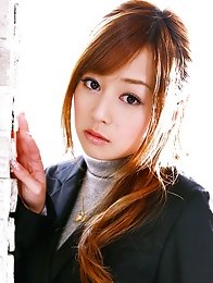 Beautiful Jun Natsukawa in a cute business suit and stockings