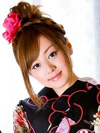 Beautiful gravure idol angel in a cute short dress and boots