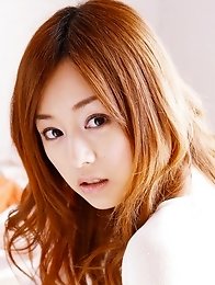 Beautiful gravure idol is adorable in cute little pink dress