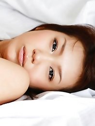 Nana Konishi poses topless and shows off her sexy boobs