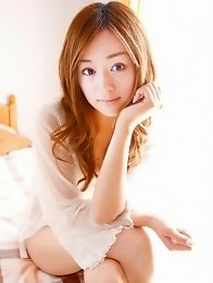 Beautiful gravure idol is adorable in cute little pink dress