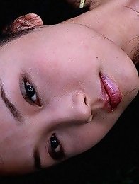 Yoko Mitsuya busty Asian posing outside in her black bikini