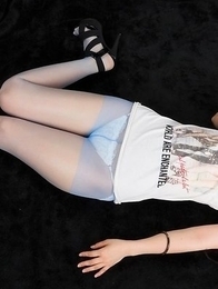 Dark-haired JAV goddess Sana Iori flaunting her pantyhose-clad legs in HQ