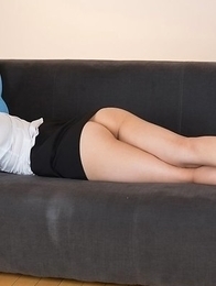 Glasses-wearing secretary Chie Kobayashi flashing her pussy on a couch
