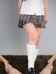 Seductive schoolgirl Sana Iori jerking a guy's cock with her delightful feet right here