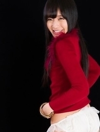 Brunette in red Moeka Kurihara teasing you with her juicy barely legal pussy on a bed
