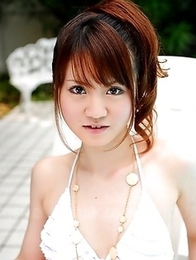 Lovely Japanese babe enjoys posing