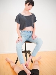 Slim seductress Anna Matsuda gives a footjob and sucks on her own toes for you