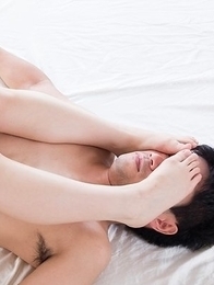 Yui Kasugano puts her feet on his face while teasing him with that smooth slit