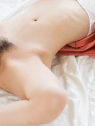 Rio Kamimoto shows her long legs and her welcoming pussy while on all fours