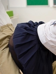 Schoolgirl seductress Uta Kohaku giving a great footjob to her teacher, after class