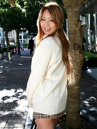 Remika Uehara poses on the street