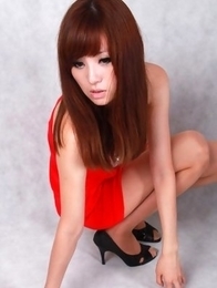 Sandy on heels shows hot behind in red dress for pictures