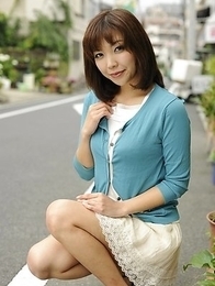 Juri Kitahara in blue sweater and lace skirt