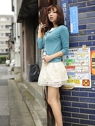 Juri Kitahara in blue sweater and lace skirt