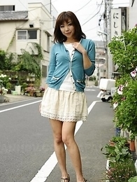 Juri Kitahara in blue sweater and lace skirt