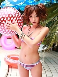 Hot Asian chick posing outdoors