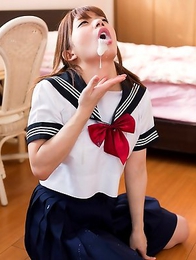 Schoolgirl Mari Rika sucking two cock