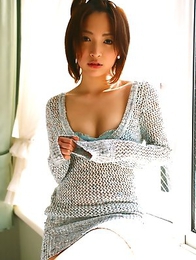 Ryoko Tanaka Asian shows leering curves in the window daylight