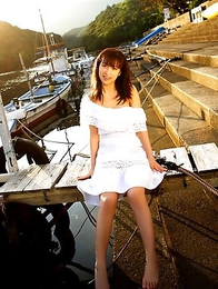 Kasumi Nakane with sexy legs shows hot cleavage outdoor