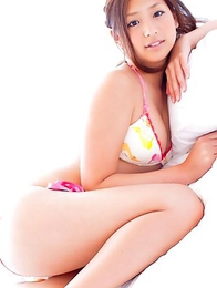 Ayaka Sayama Japan smiles while revealing curves in red lingerie