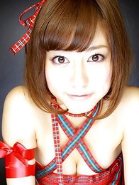 Yumi Sugimoto Asian shows sexy legs in red outfit and sandals