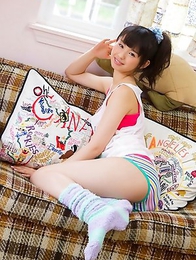 Rina Koike in socks and colorful bath suit is so playful