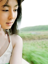 Rina Akiyama with sexy lips rubs her cunt of bar outdoor