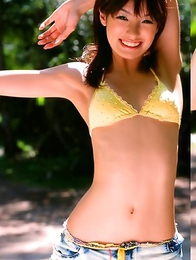 Akina Minami in colorful bath suits plays with big ball