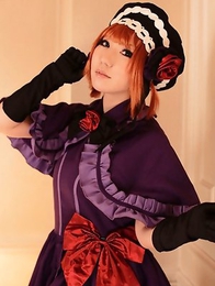 Saku looks just like a doll in her mauve old times dress