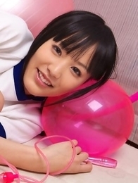 Yuri Hamada in sports equipment plays with balloons a lot