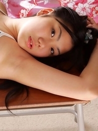 Miho Takai in nylon outfit plays with ball and on desks