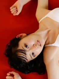 Airi Suzuki in bath suit enjoys petals all over her body