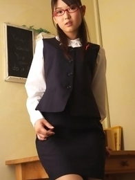 Noriko Kijima with specs and office suit is elegant and hot