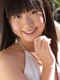 Hijiri Sachi in shorts and bra enjoys sun on her curves