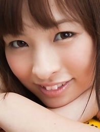 Maho Kiruma shows sexy curves in bath suit in her garden